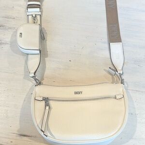 White DKNY crossbody bag.